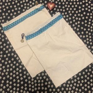 Two Tory Burch shoe dust bags